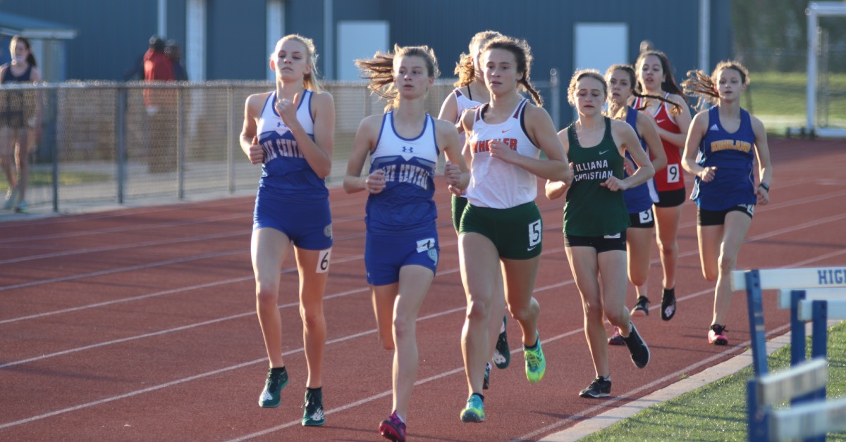 Students Motivate Each Other At Highland High School Track Field 